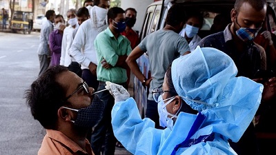 India records 30,570 COVID-19 cases, 431 deaths