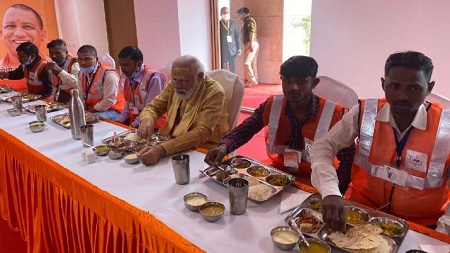 Kashi corridor: PM Modi showers petals on workers, has lunch with them