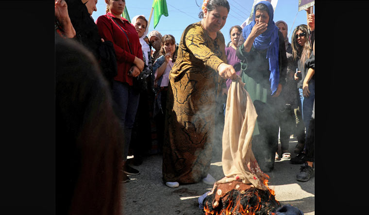 Death toll rises as Iranians continue to protest Mahsa Amini's death